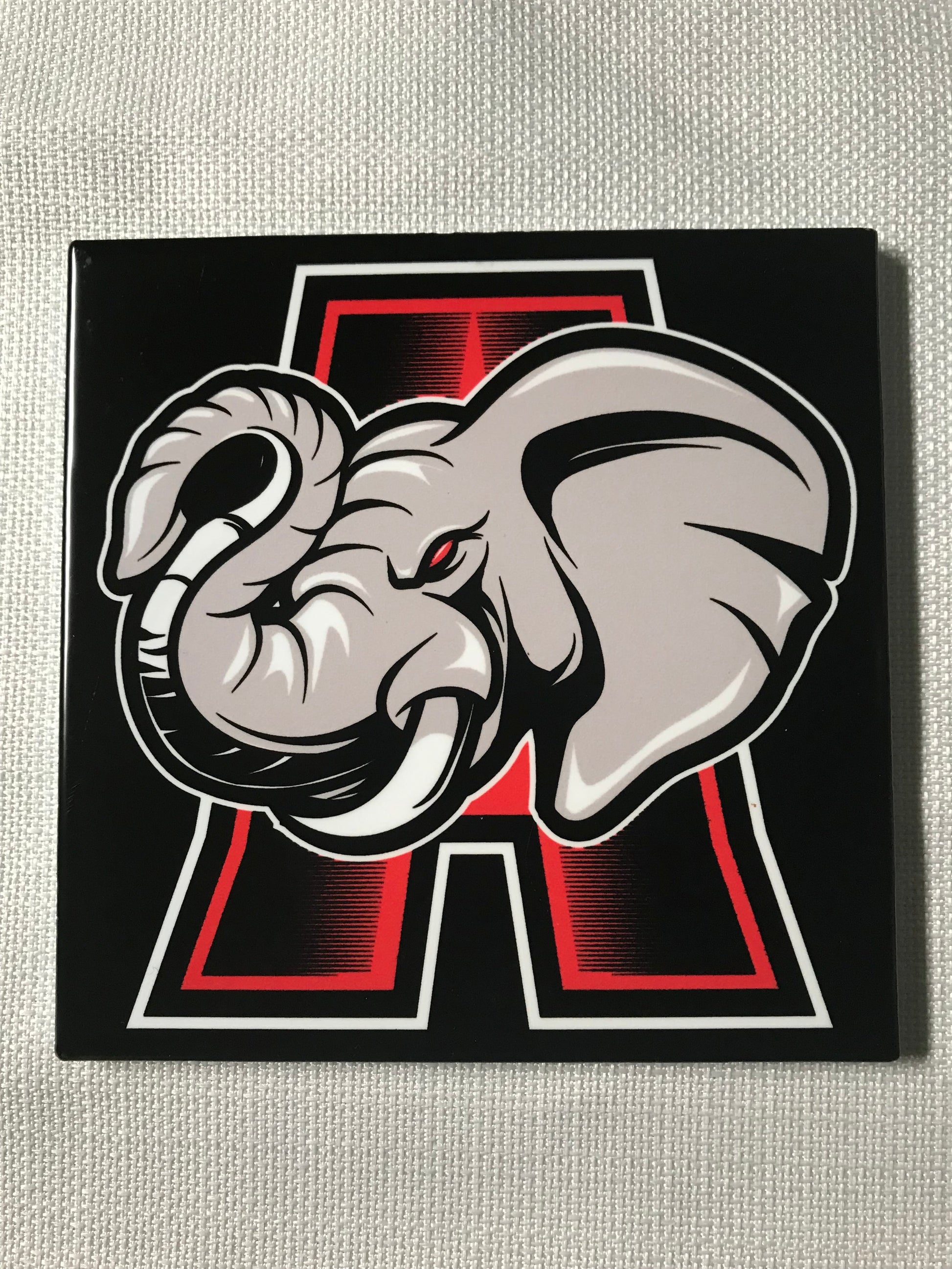 Custom Alabama Ceramic Tile with Elephant over an A. This is a satin look tile.